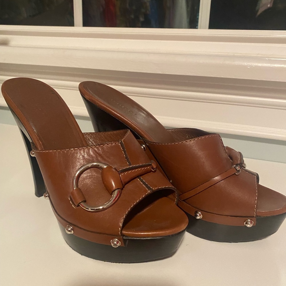 Gucci horsebit platform sandals.